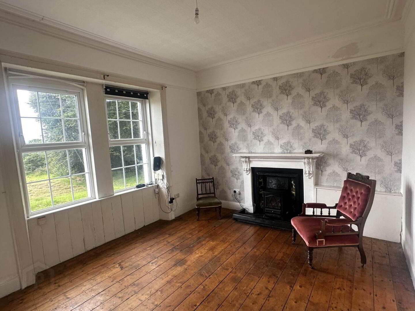 Drawing room with original marble fireplace